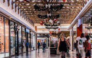 Shoppers walking around mall with retail display fixtures Toronto